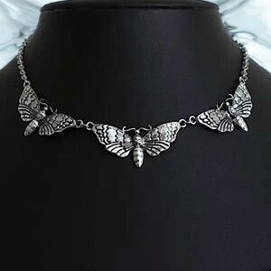 Sexy and dark silver toned dead head moth pendants choker necklace